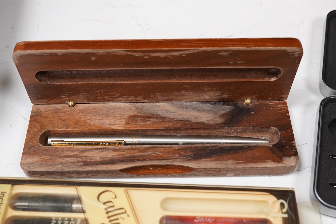 A quantity of boxed fountain pens and ballpens